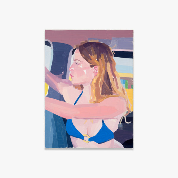 Young Woman in a Car