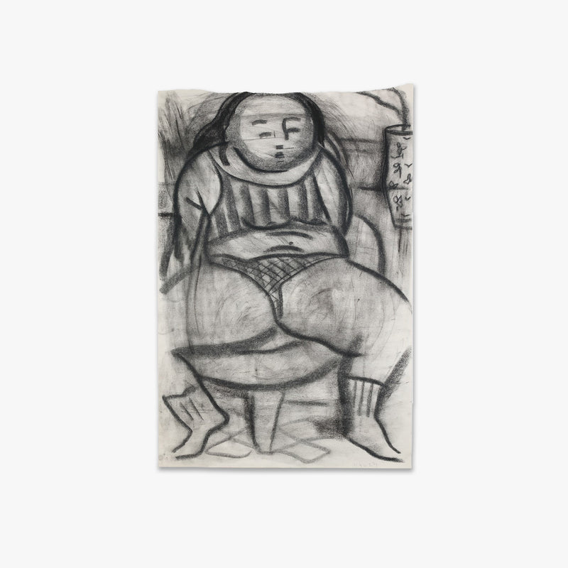 leaning back on ottoman in charcoal